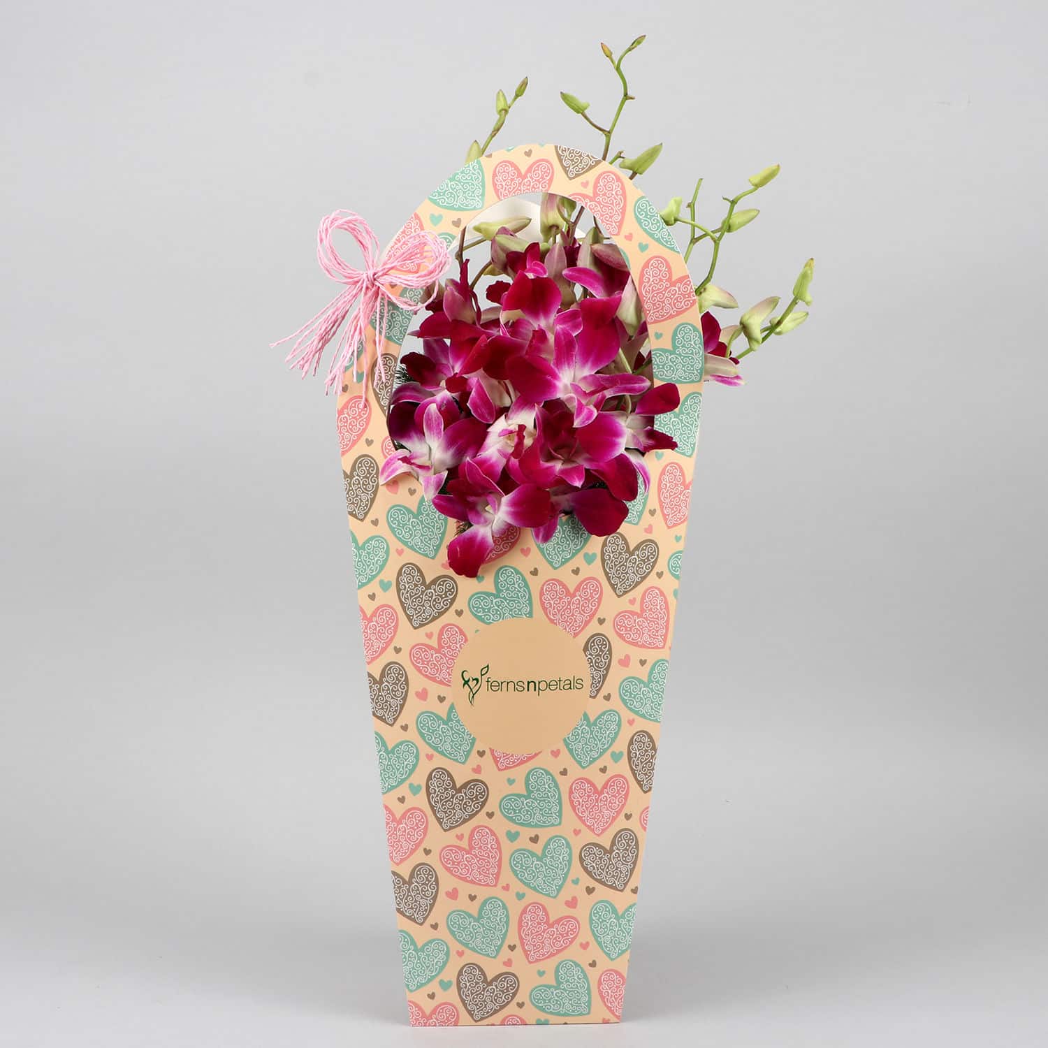 Buy/Send Butterscotch Cake &  Purple Orchids in FNP Heart Sleeve Online ...