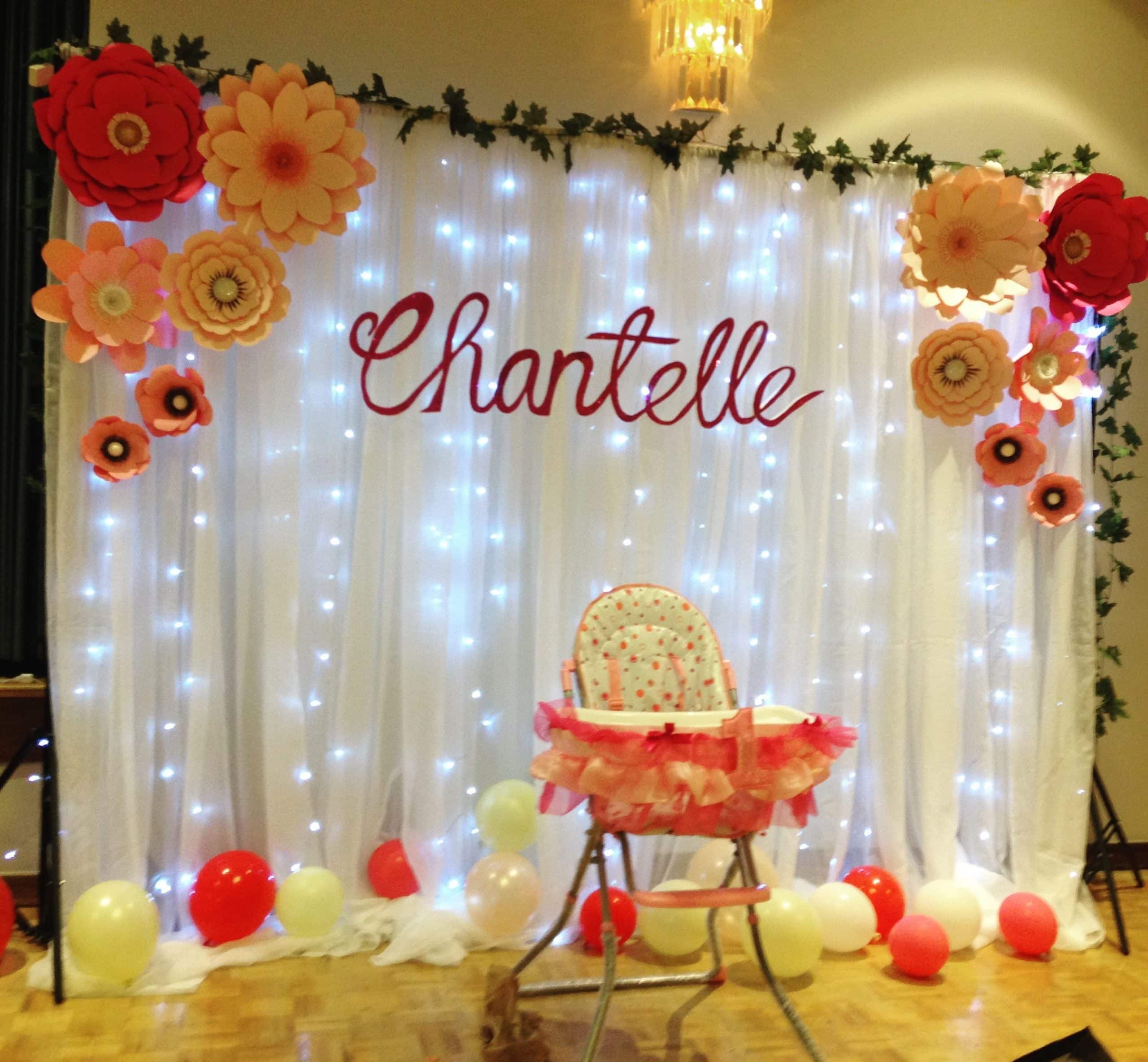 First birthday Backdrop with lights and personalized name.