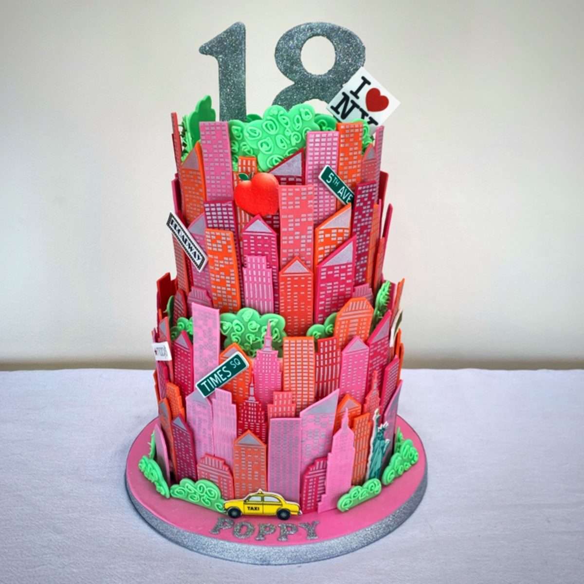 New York skyline cake for an 18th pink and sparkle theme